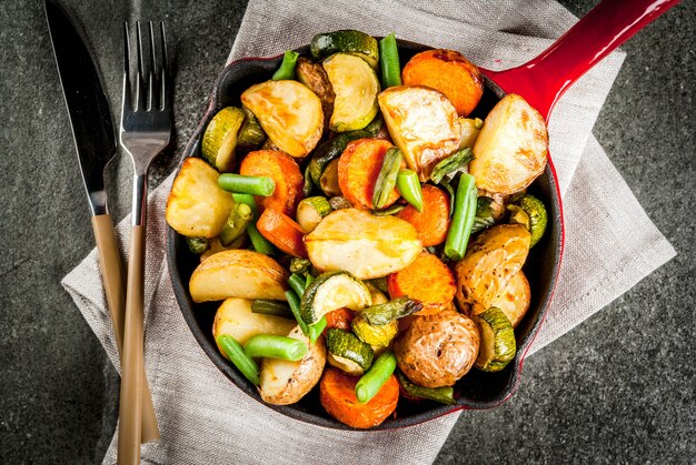 Skillet with fried seasonal autumn vegetables