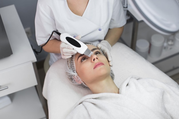 Skin Care Closeup Of Beautiful Woman Receiving Ultrasound Cavitation Facial Peeling