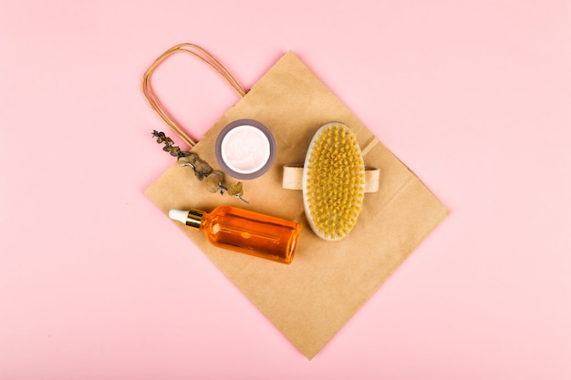 Photo skin care products. anti-cellulite massage brushes. top view. massage brush. on a pink background. accessories for massage.