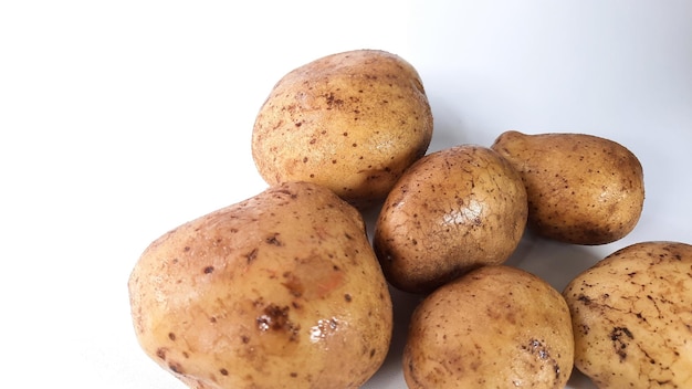 Skin details of some freshly washed potatoes