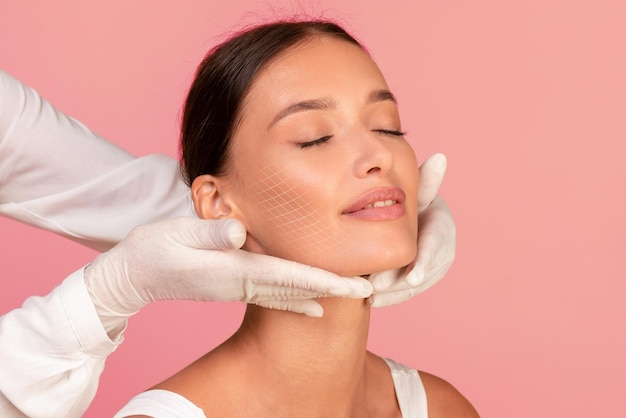 Skin Rejuvenation Beautician Doctor Examining Face Of Beautiful Young Female