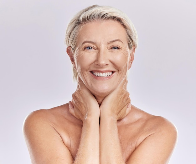 Skincare bodycare and face of a mature woman with wrinkles and anti aging beauty hygiene routine Portrait of happy senior lady with a healthy wellness and self care lifestyle in a studio