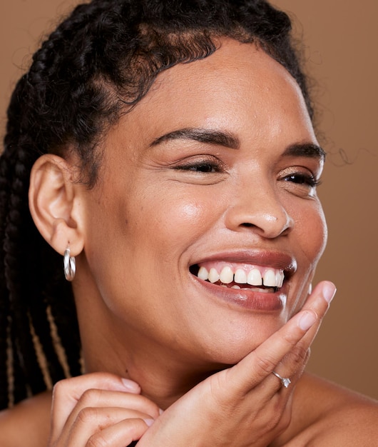 Skincare glow and beauty black woman in studio happy with cosmetics natural makeup and dermatology results Young model face with facial care shine wellness and healthy or luxury youth promotion