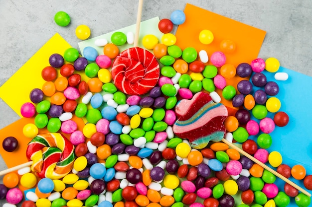 Skittles candy on the colorful table colorful sweet candy