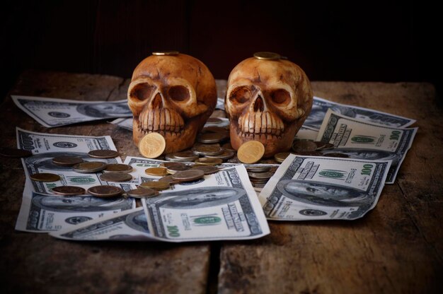 skull on bank note and coin money concept in work for money and death because of money