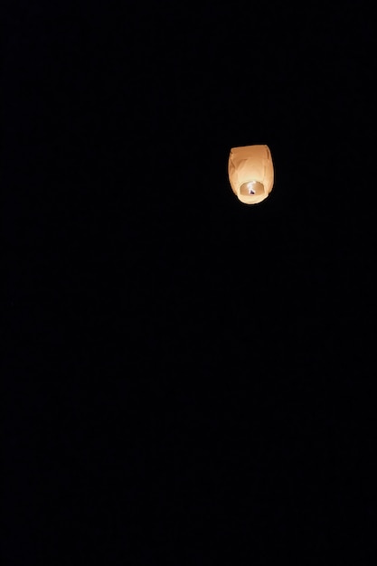 Sky lantern floating into the night sky at the festival in Pingxi, the Chinese 
