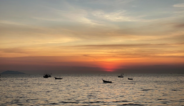 Sky sunset at beach scenery,Whether it's the warm hues of a sunrise or sunset,shimmering reflection