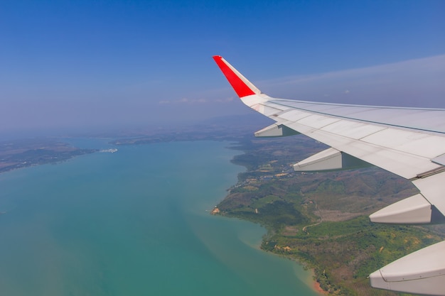 Sky wings and white clouds flying over phuket, thailand