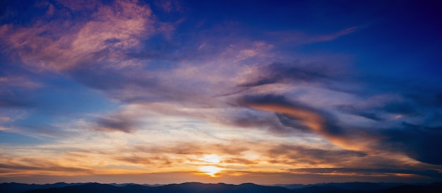 Sky with clouds and sun