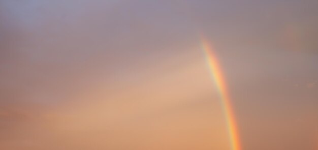 Sky with rainbow after a storm