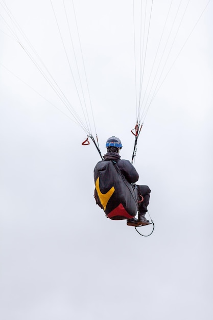 Skydiving extreme sports parachutist with a parachute unfolded The sportsman flying on a paraglider