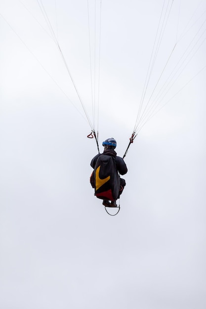 Skydiving extreme sports parachutist with a parachute unfolded