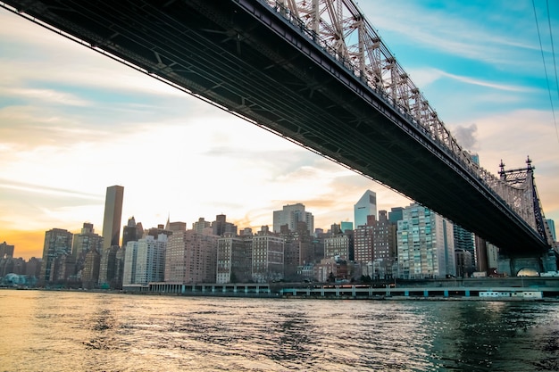 Skyline of downtown Manhattan and bridge in New York on a cloudy day