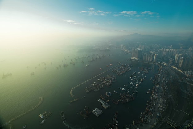 Skyline of Hong Kong at sunset from Sky 100