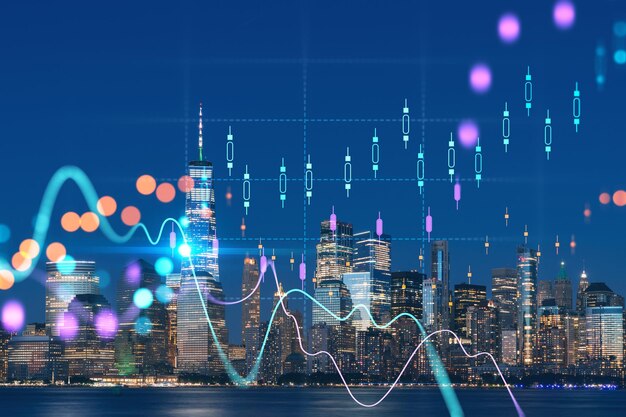 Skyline of New York City Financial Downtown Skyscrapers at night Manhattan NYC USA View from New Jersey Forex candlestick graph hologram The concept of internet trading brokerage analysis