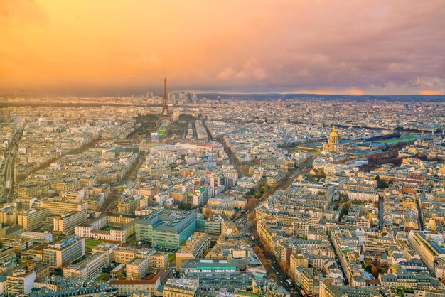 Skyline of Paris with Eiffel Tower at sunset in France from top view