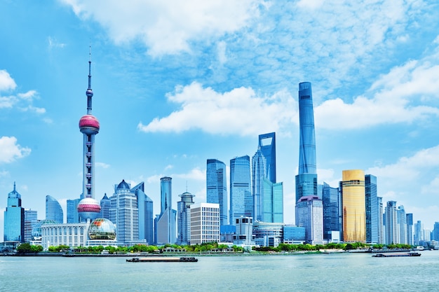 Skyline view from Bund waterfront on Pudong New Area- the business quarter of the Shanghai.Picture is blue toned.