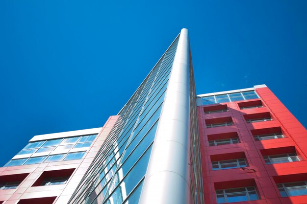 Skyscraper with mirrored windows and clear blue sky