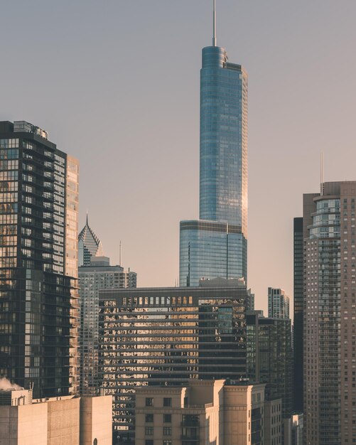 Skyscrapers in city against clear sky