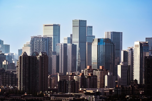 Skyscrapers in city against clear sky