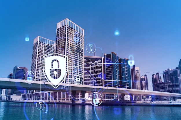 Skyscrapers of Dubai business downtown International hub of trading and financial services Lock icon hologram concept of datum security Double exposure Dubai Canal waterfront