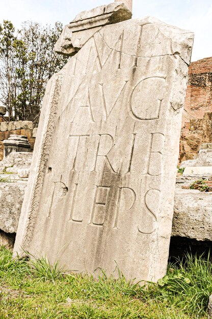 Photo slab of the roman forum with inscriptions in latin