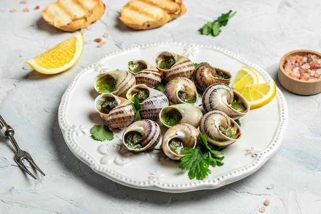 Slakken gebakken met saus Bourgogne Escargot Slakken Gebakken slakken met boter en kruiden gastronomisch eten banner menu recept plaats voor tekst bovenaanzicht