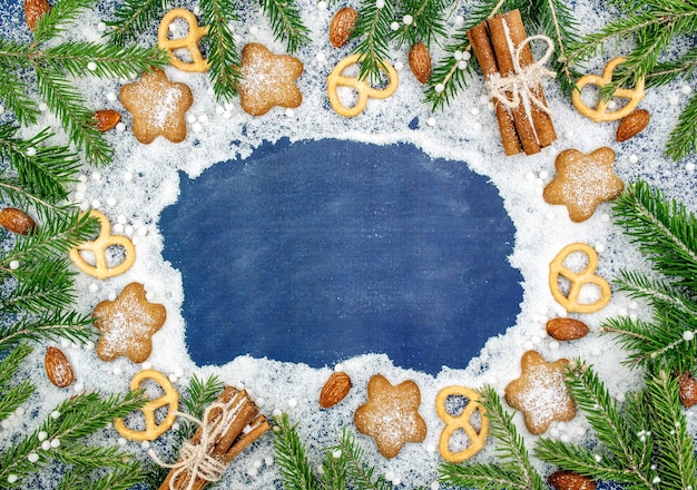 Slate background copy space for Christmas and new year Kitchen texture with cookies and flour Fir