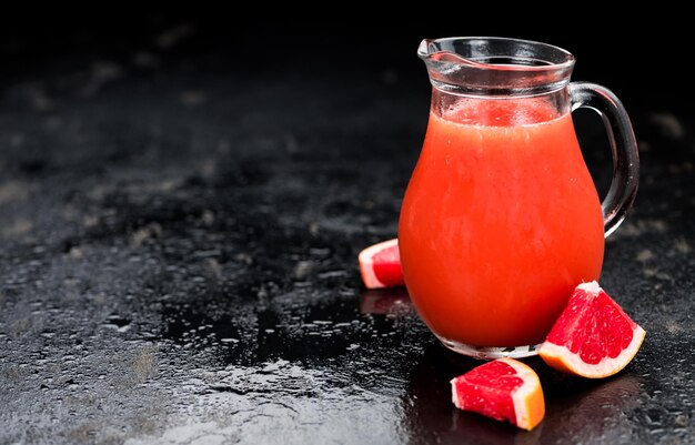 Slate slab with freshly squeezed Grapefruit Juice