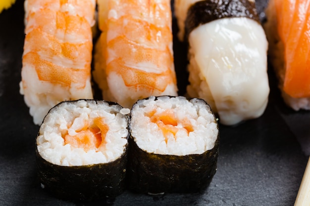 Slate tray of assorted sushi