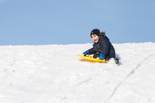 Sledding at winter time