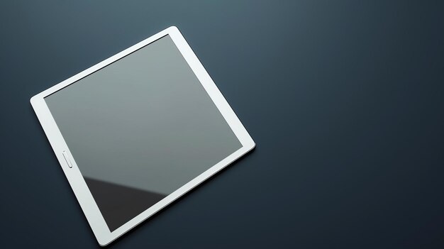 A sleek silver tablet sits on a solid blue background The tablet is angled to the right of the frame