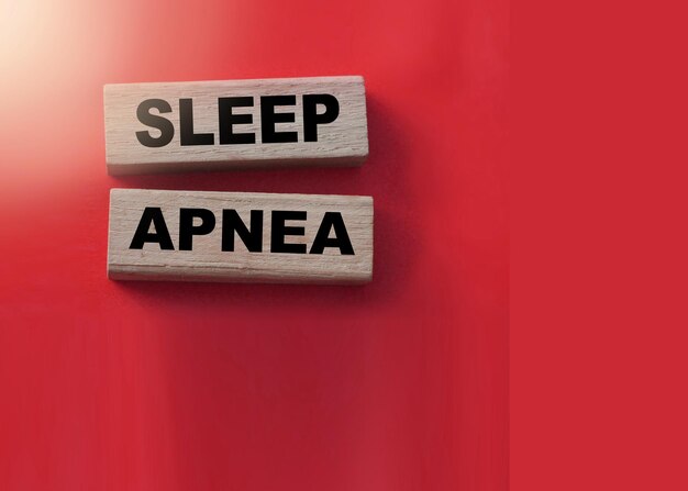 Photo sleep apnea words on wooden blocks sleep disorders healthcare concept