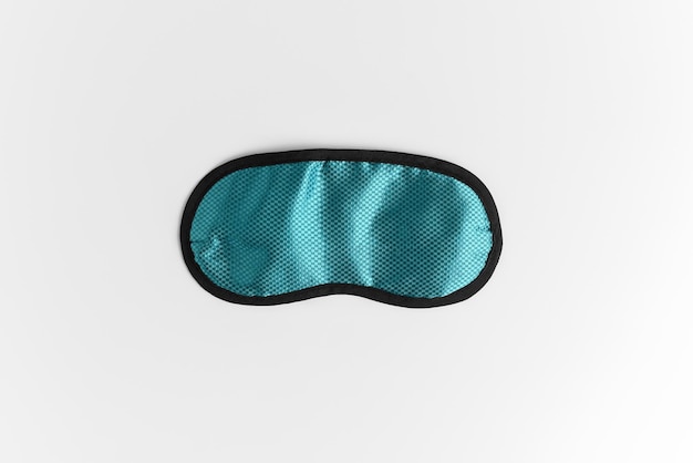 Photo sleep mask on a white background. top view, flat lay. healthy sleep concept.