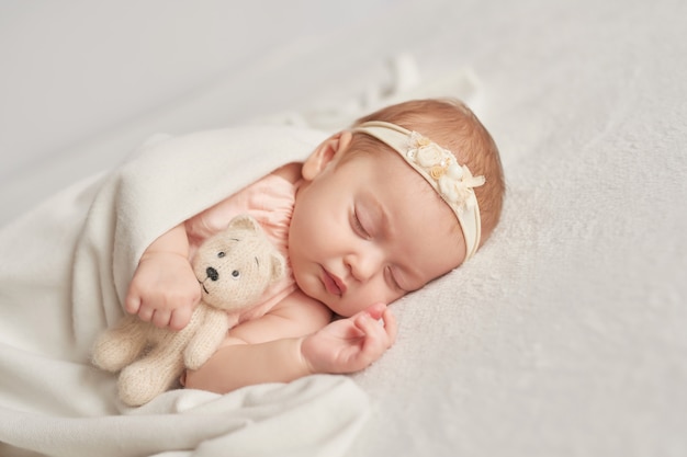 Photo sleeping baby 3 months on a light