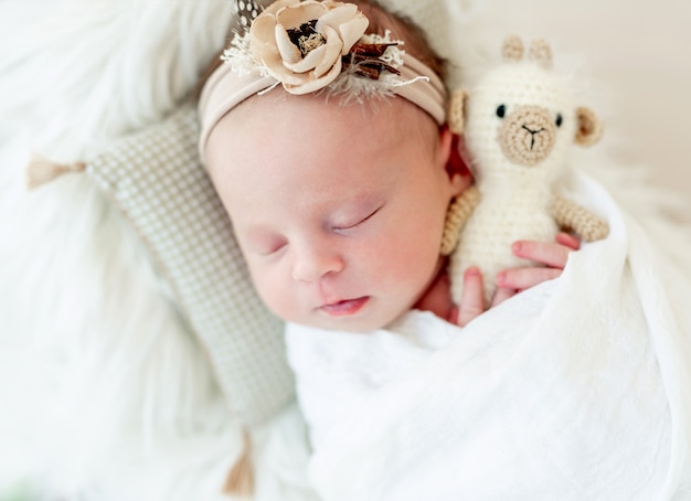 Sleeping newborn baby girl