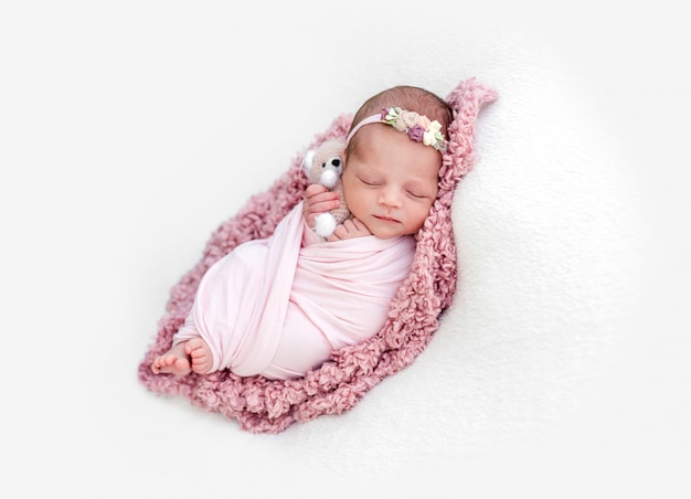 Sleeping newborn baby girl