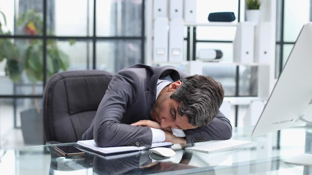 Sleeping tired and business man in meeting for overworked exhausted and stress