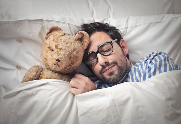 Sleeping with a teddy bear