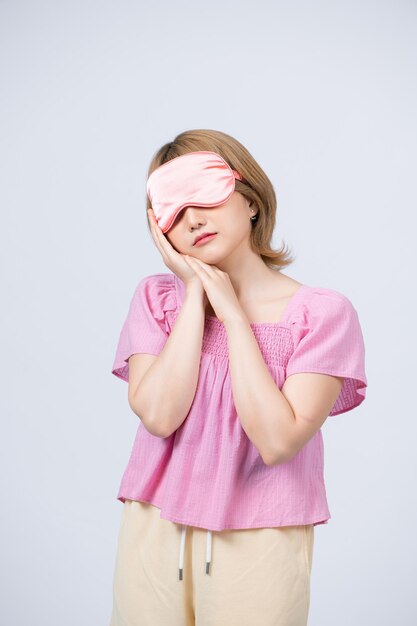 Sleepy beauty woman resting on hand