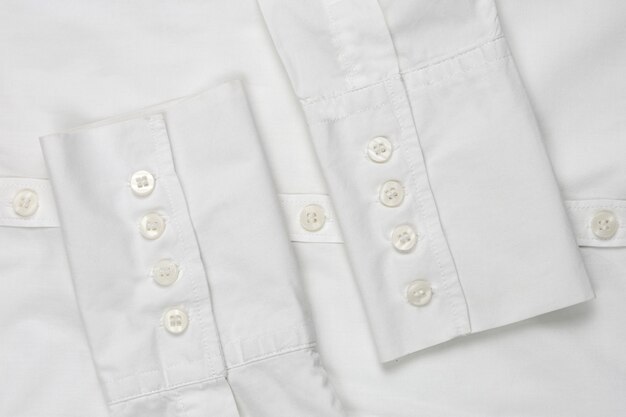 Premium Photo | Sleeve white shirt with buttons, top view