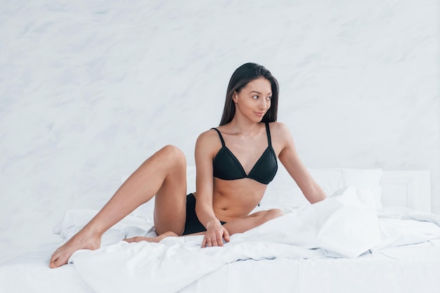 Woman in Black Underwear Sleeping in Bed in Seductive Pose without Blanket.  Stock Image - Image of european, home: 194173105