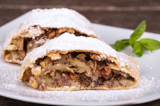 Slice of an apple strudel on a plate