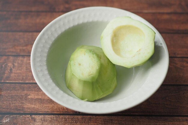 slice of avocado on wooden table