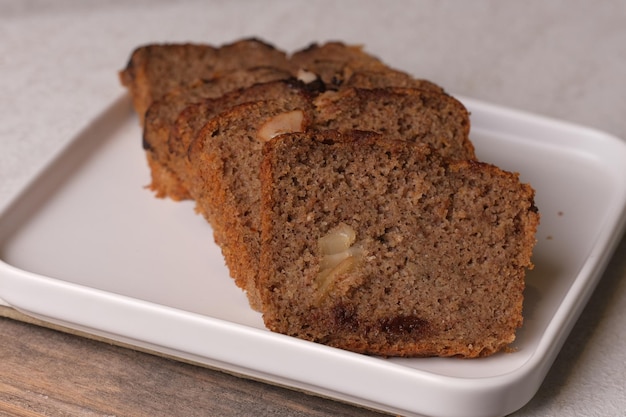 A slice of banana bread on a plate