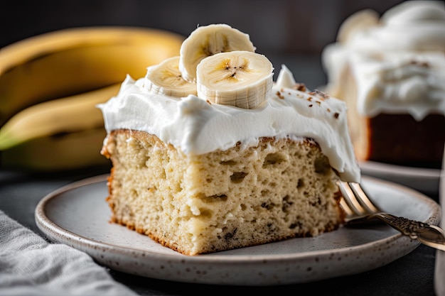 Slice of banana cake topped with creamy and fresh whipped cream