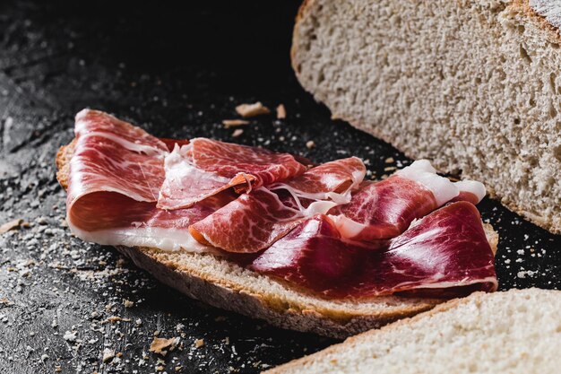 slice of bread seasoned with serrano ham