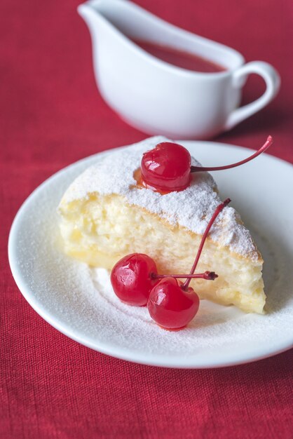 Slice of cheesecake on the white plate