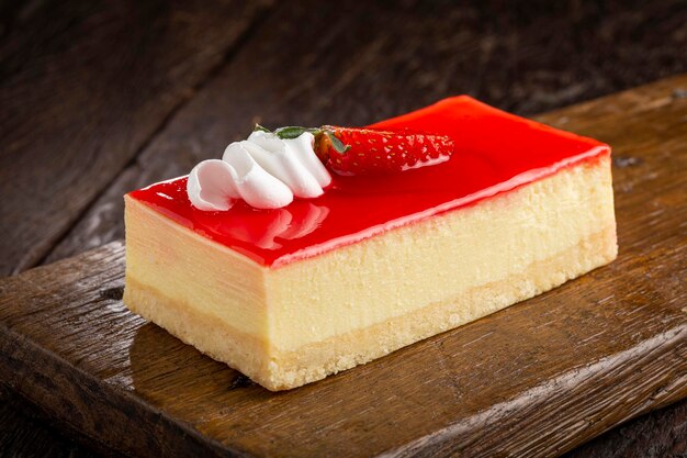 Slice of cheesecake with strawberry topping