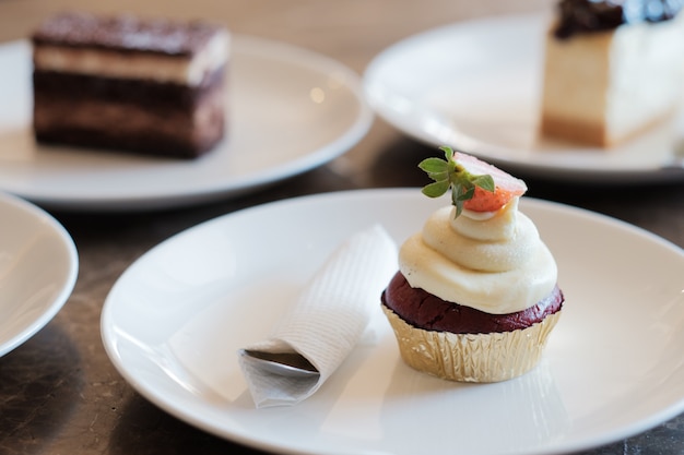 A slice of delicious cup cake. Piece of cup Cake on a Plate. Sweet food. Sweet dessert. Close up.